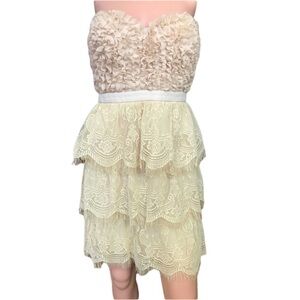 Minuet lace and ruffled strapless dress size med.